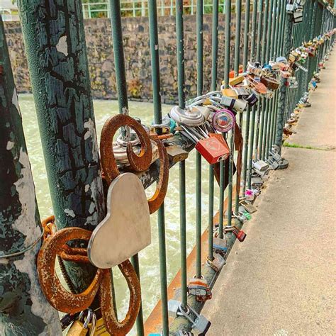 Along this romantic seaside path there were padlocks attached to the chain linked fences, a place where couples could bring their. . Lock bridge near me